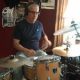 Teacher John Knight playing drums