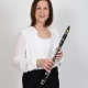 Teacher Miriam Culley holding a clarinet